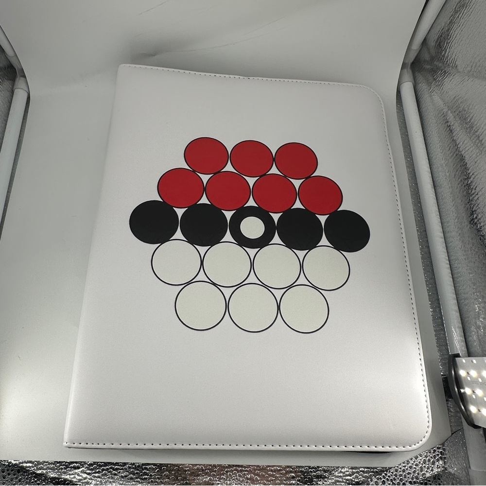 White Portfolio with Red and Black Circle Design